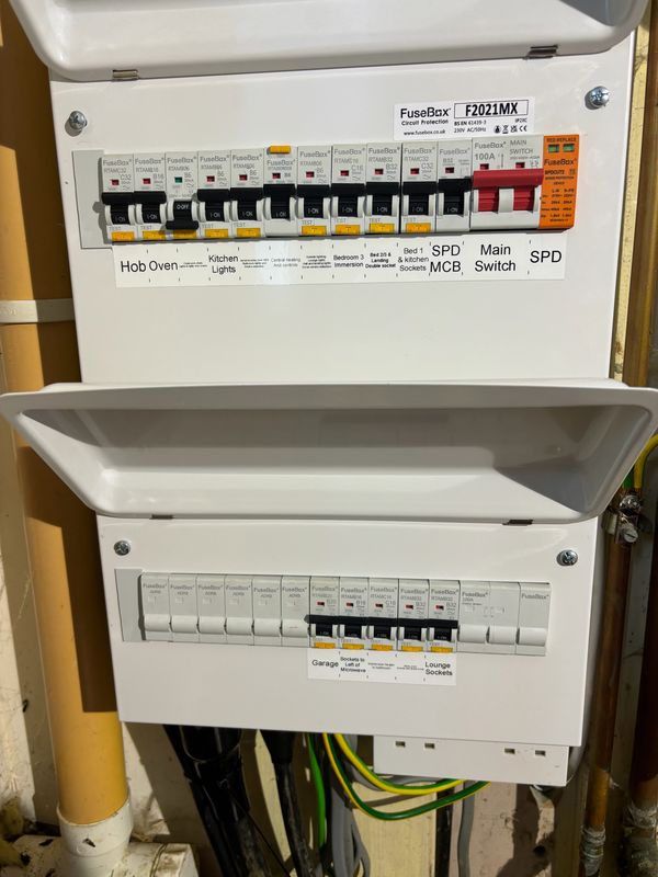 FuseBox F2021MX dual consumer unit with neatly labelled RCBO circuits and surge protection, installed by AK Electrical
